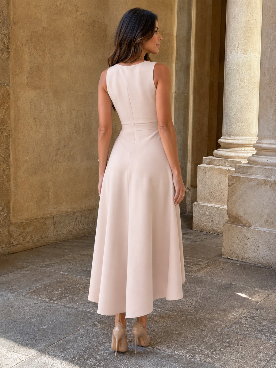 Vestido midi cruzado con bajo asimétrico